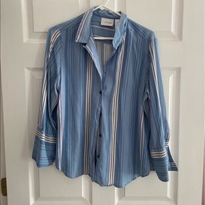 Light blue striped flannel size Large, fits a medium as well